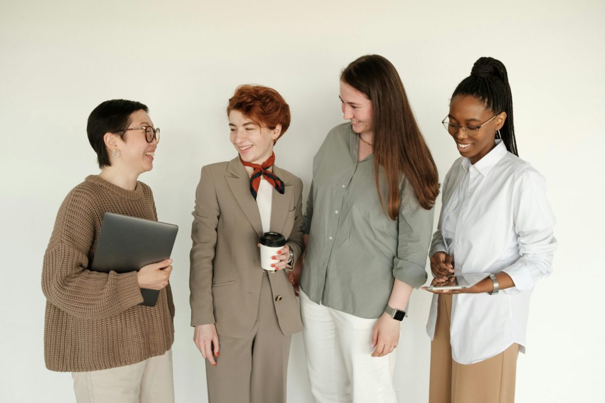 A group of co-workers smiling during a meeting